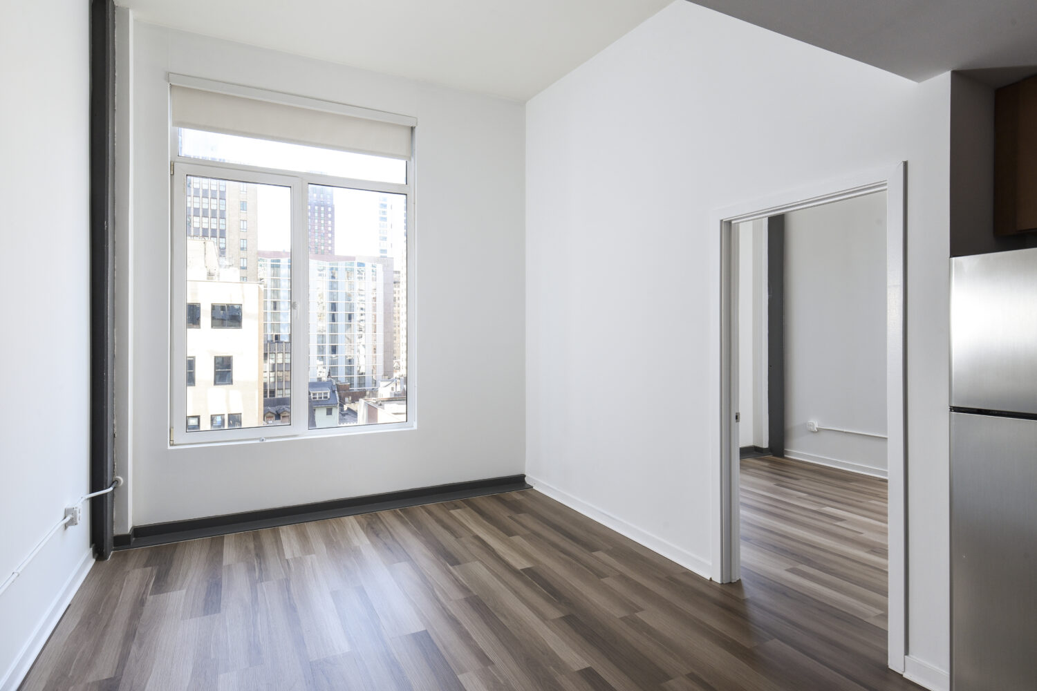 living area with large window to enjoy city views