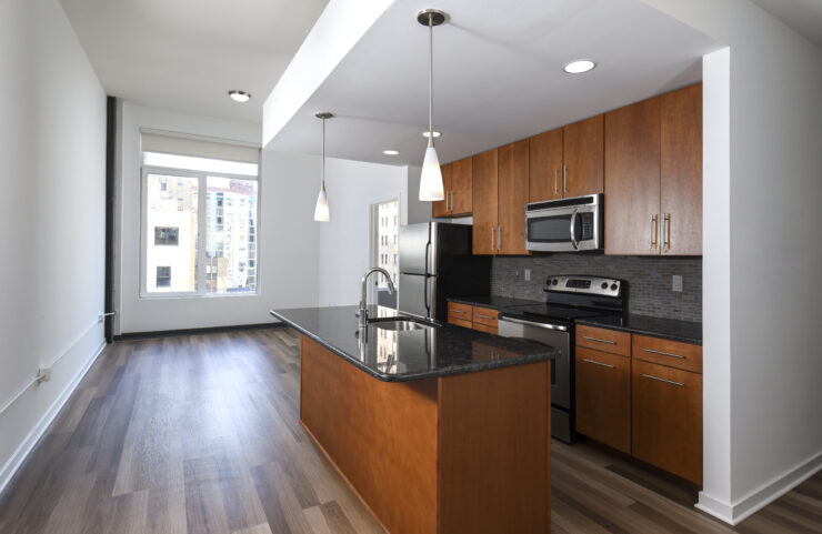 large open kitchen with hardwood floors