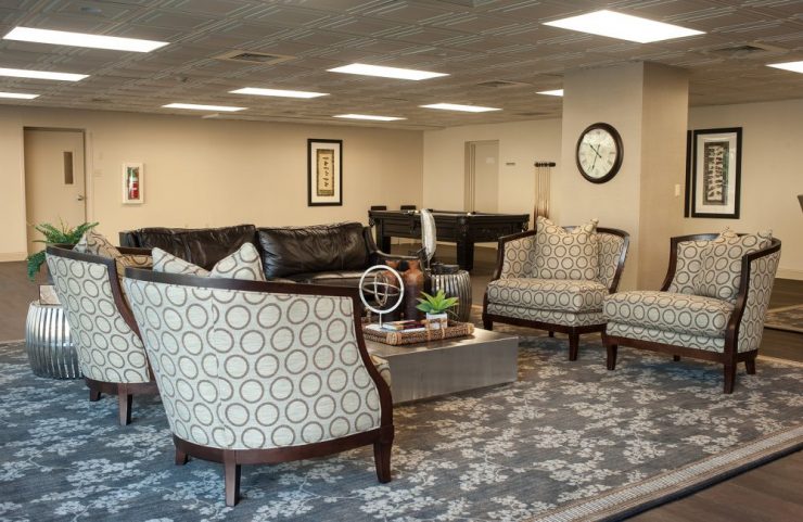 resident lounge with a variety of comfortable chairs