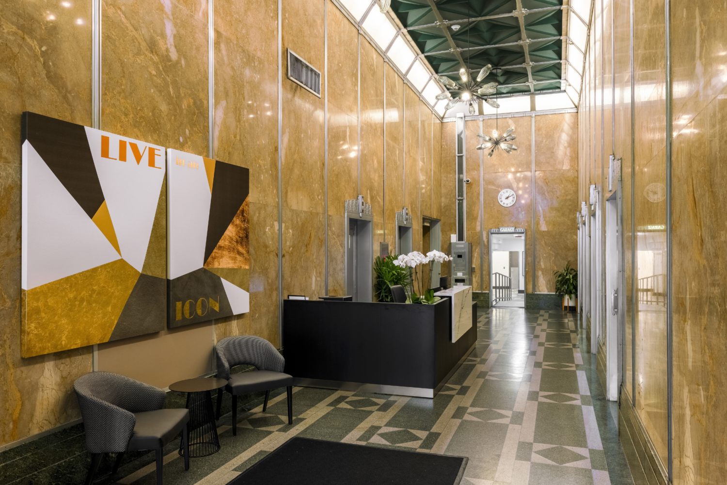 apartments in rittenhouse square philly Lobby with Art Decco Style Elevators with glazed black brick and grey porcelain flooring and a cast-bronze portal