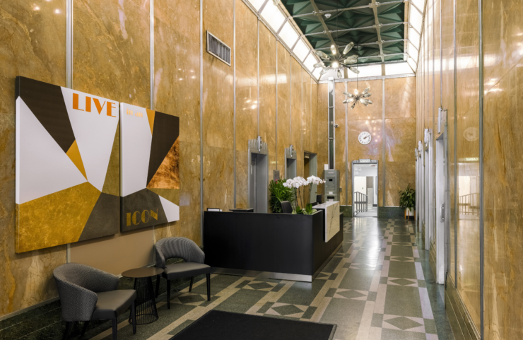 apartments in rittenhouse square philly Lobby with Art Decco Style Elevators with glazed black brick and grey porcelain flooring and a cast-bronze portal