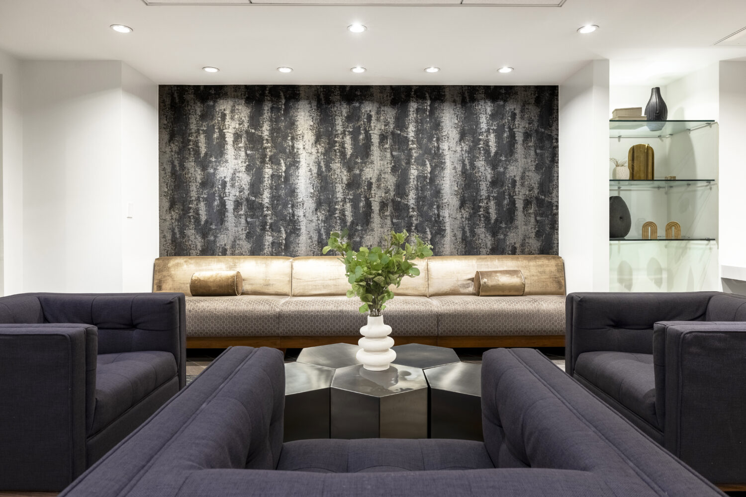 sofa and chairs in a section of the lounge