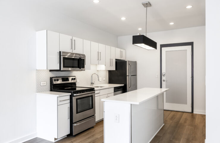 open kitchen layout with quartz top center island