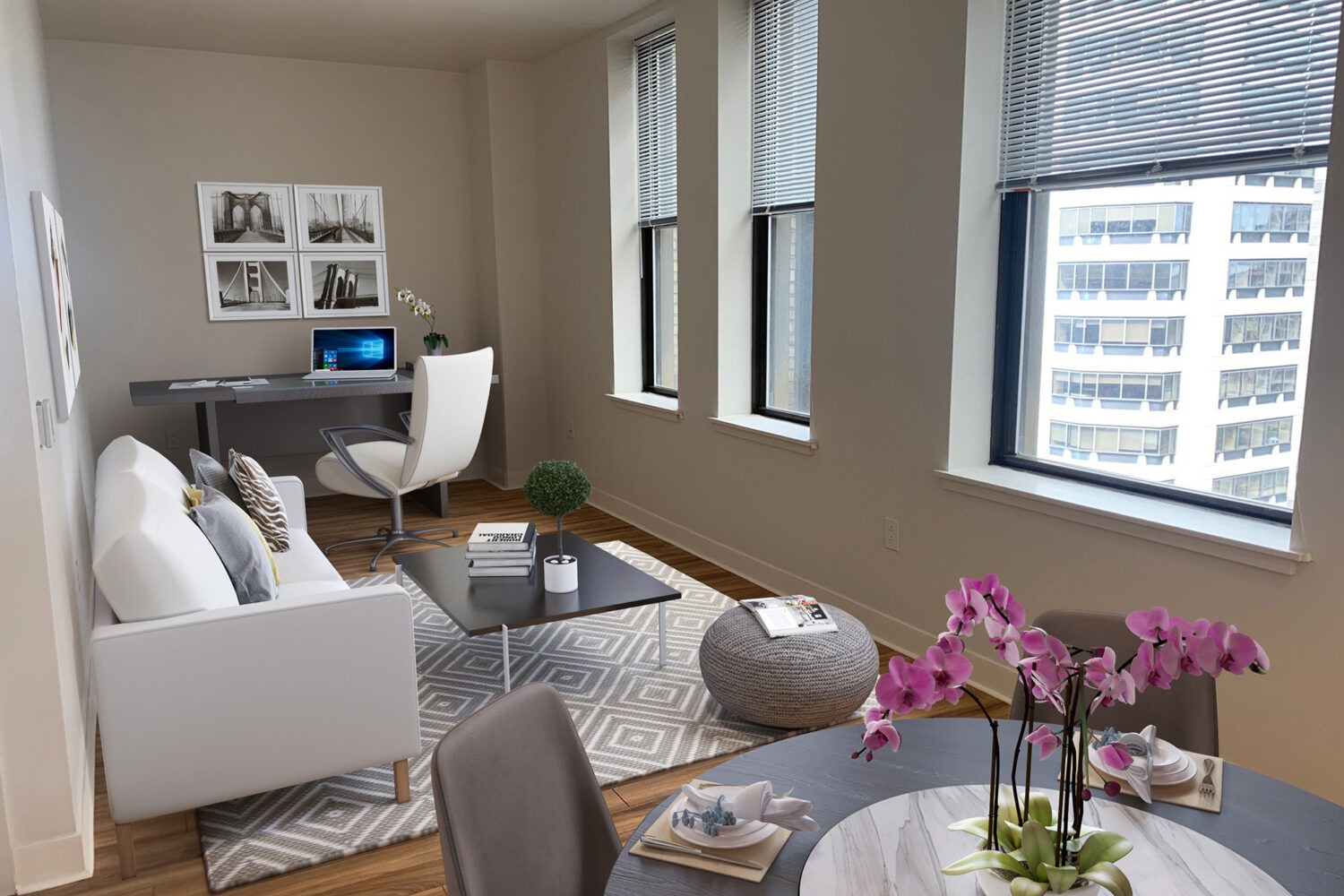 living room with room for a desk and plank wood flooring