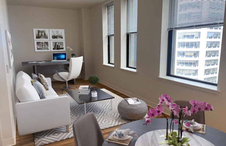 living room with room for a desk and plank wood flooring