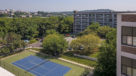 Aerial view of bridgeview apartments and tennis courts