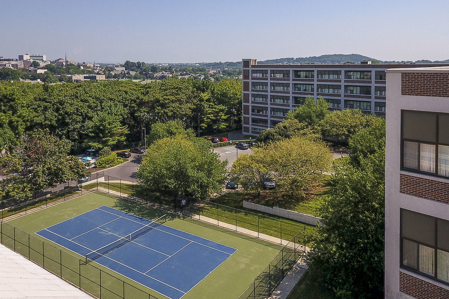 Aerial view of bridgeview apartments and tennis courts