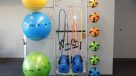 gym equipment including bands, yoga mats and weight balls 