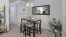 dining area with a high top table and chairs 