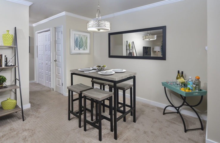 dining area with a high top table and chairs 