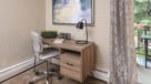 study area with desk and chair 