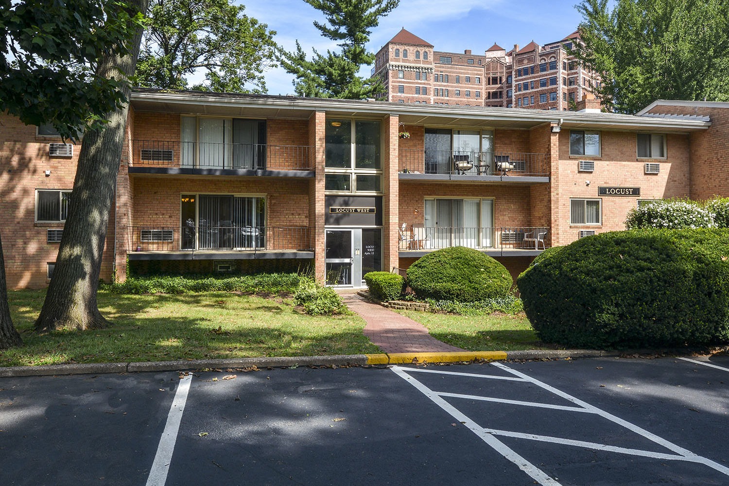exterior showing balconies and parking lot