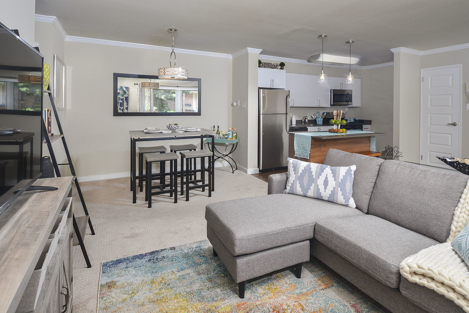 living room open to dining area and kitchen