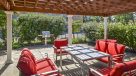 pergola are with table and chairs 