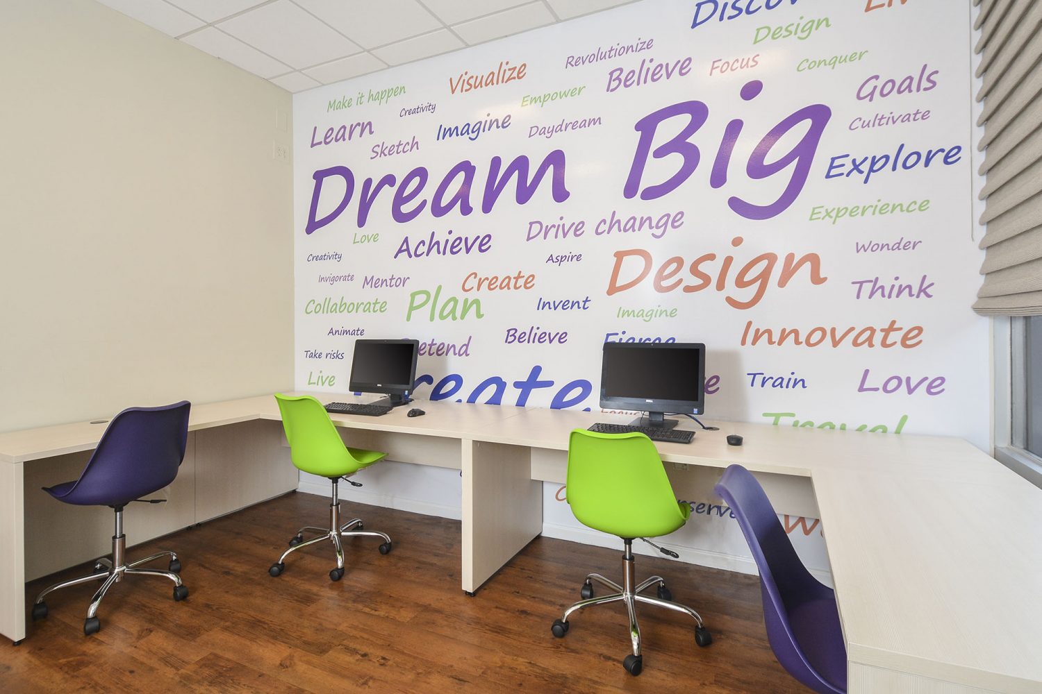 business center with computers and desks 