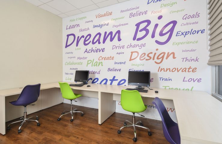 business center with computers and desks 