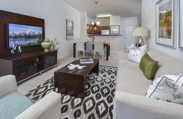 large living and dining room with wall to wall carpet 