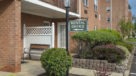 entrance sign pointing to rental office