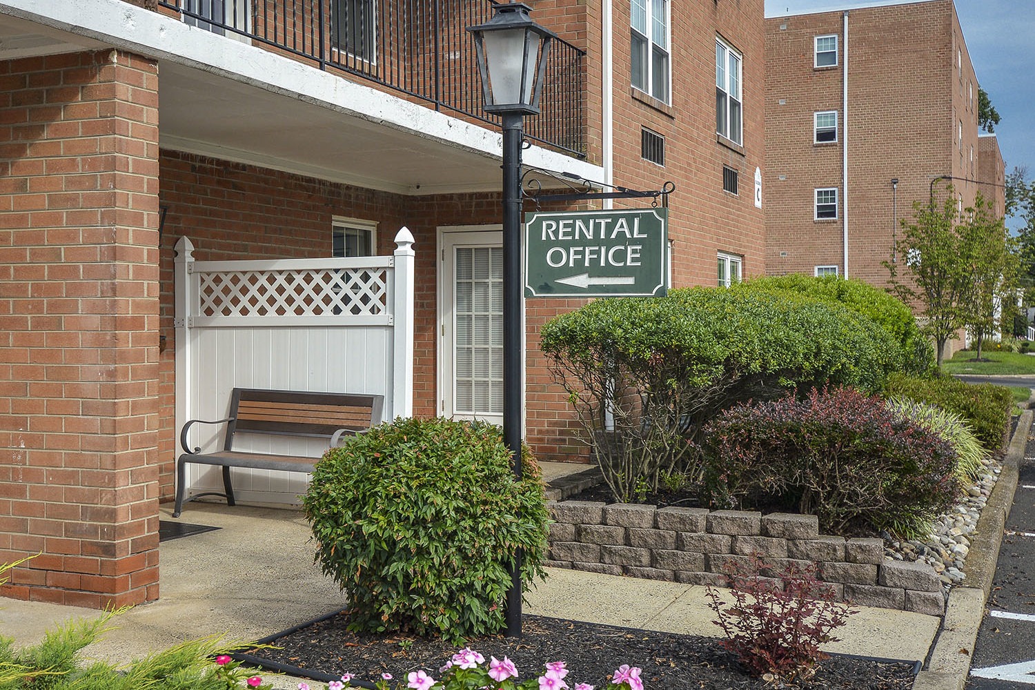 entrance sign pointing to rental office