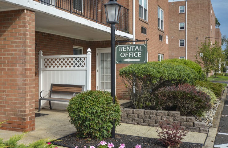 entrance sign pointing to rental office