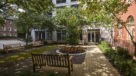 shaded courtyard with benches and walkways