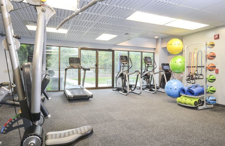 fitness center with cardio machines 