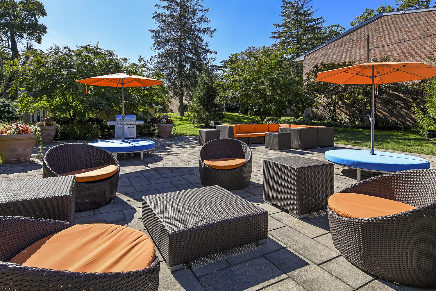 outdoor lounge area with umbrellas for shade
