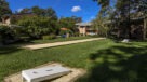 cornhole setup on the lawn