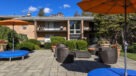 outdoor lounge area with umbrellas for shade