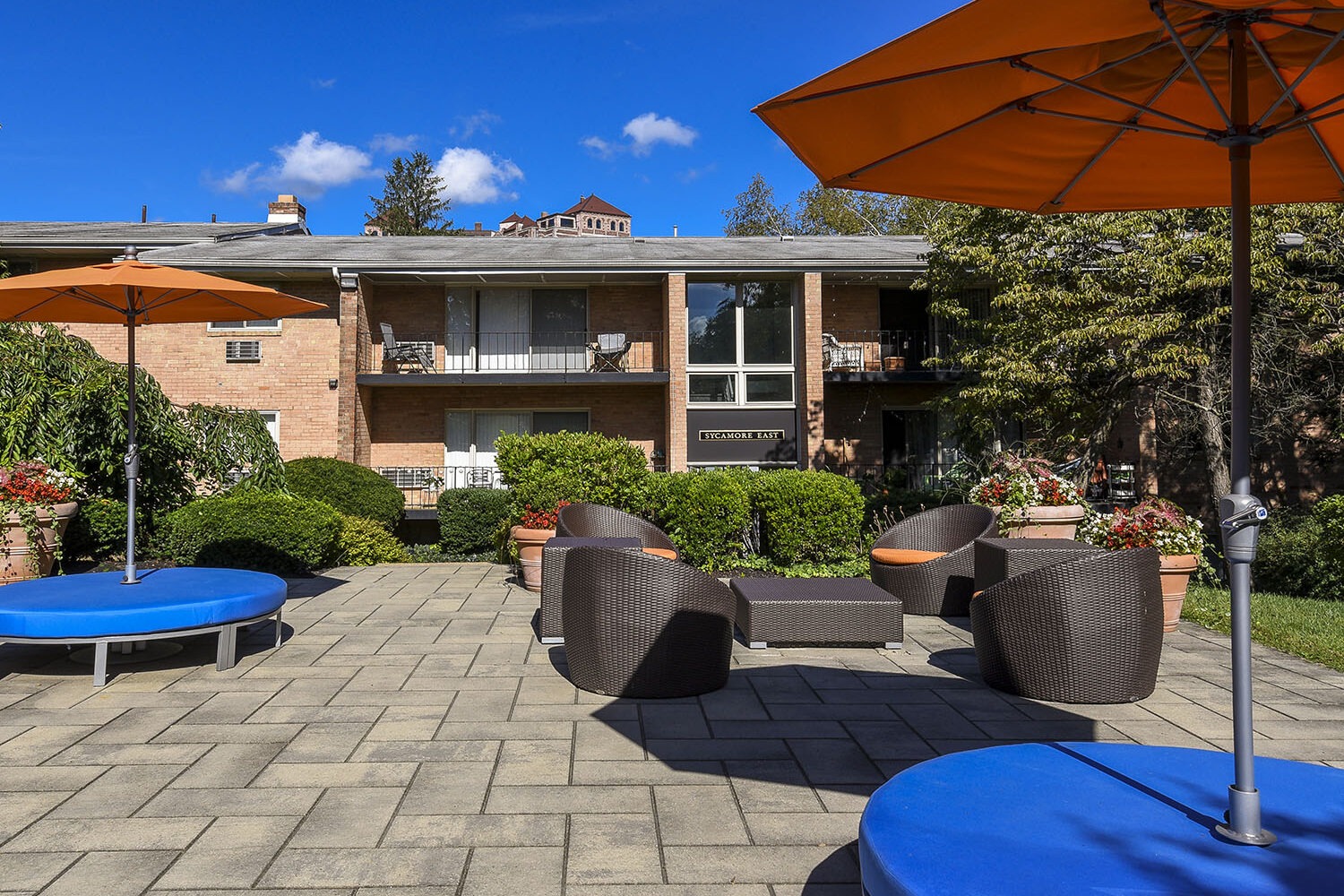 outdoor lounge area with umbrellas for shade
