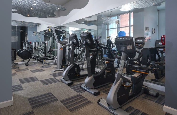 fitness center with cardio machines
