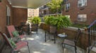 huge outdoor patio with room for a large table and chairs