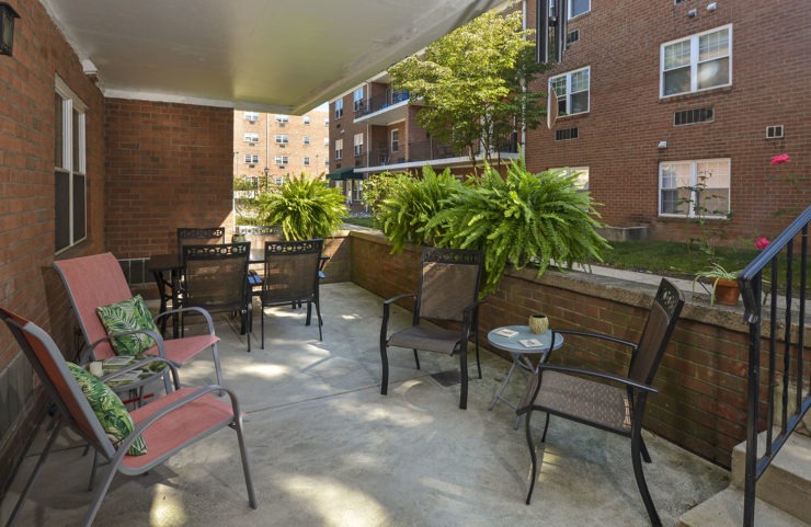 huge outdoor patio with room for a large table and chairs