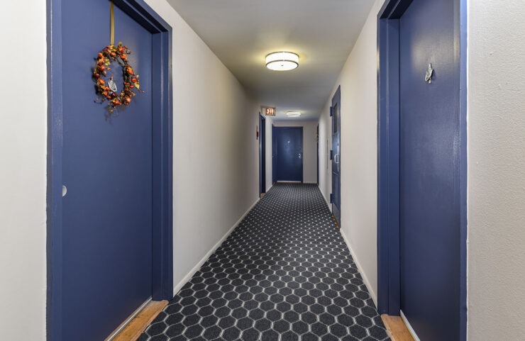 hallway with resident entrances