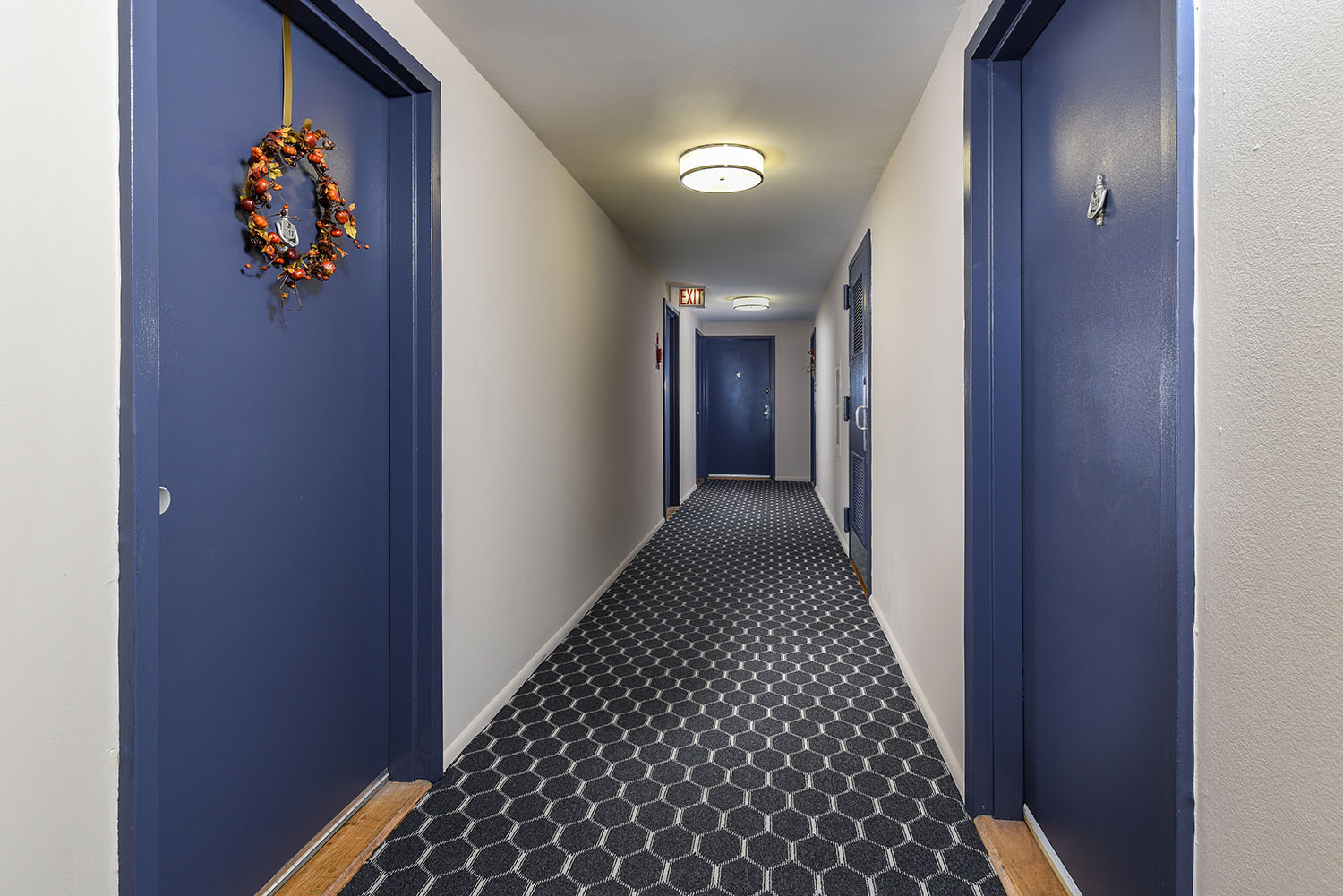 hallway with resident entrances