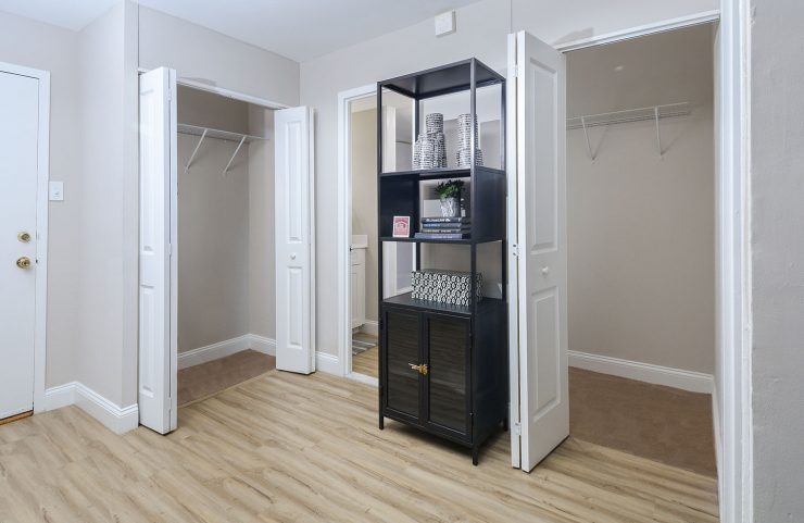 entrance into the apartment with light wood floors