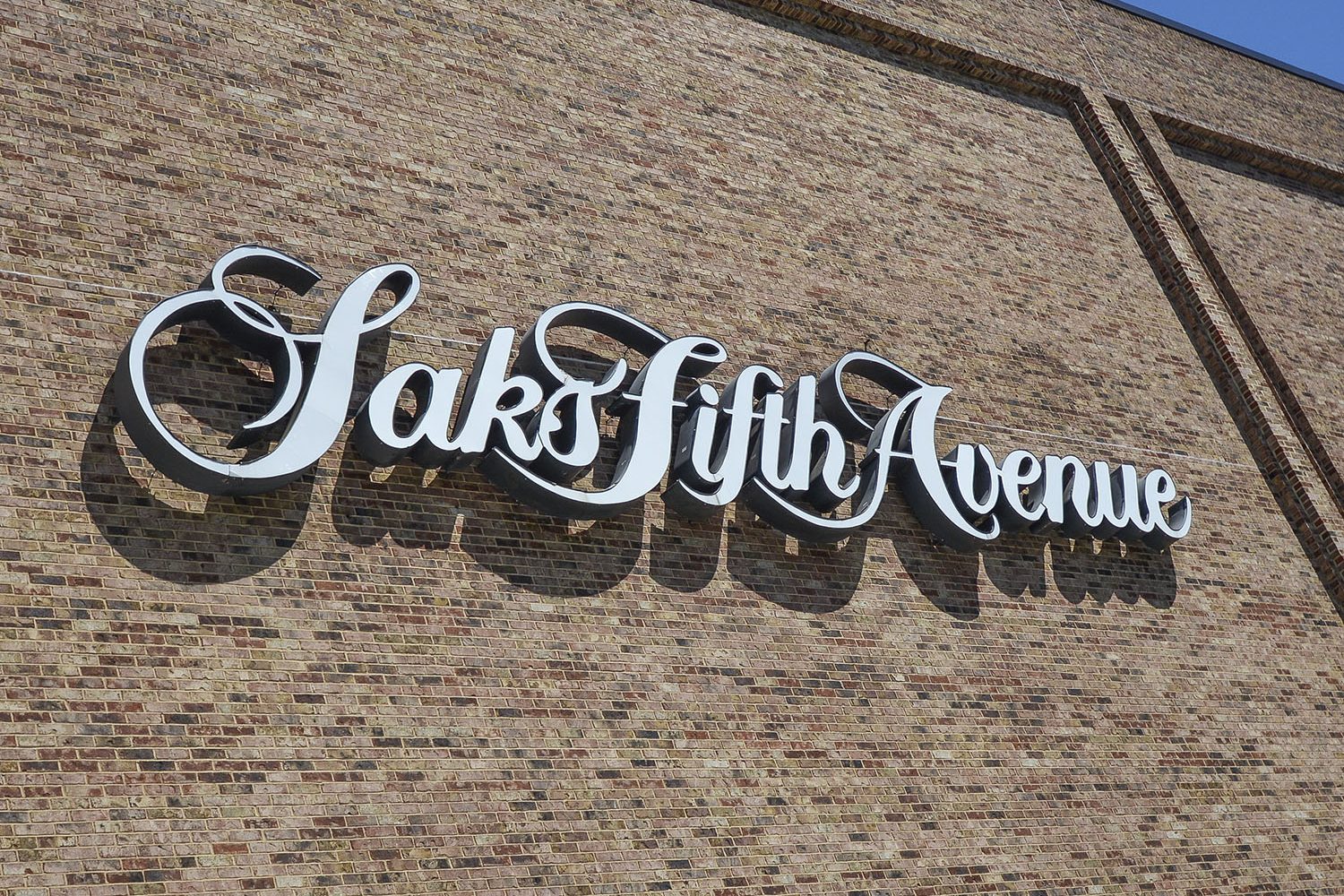 Nearby: Saks Fifth Avenue signage