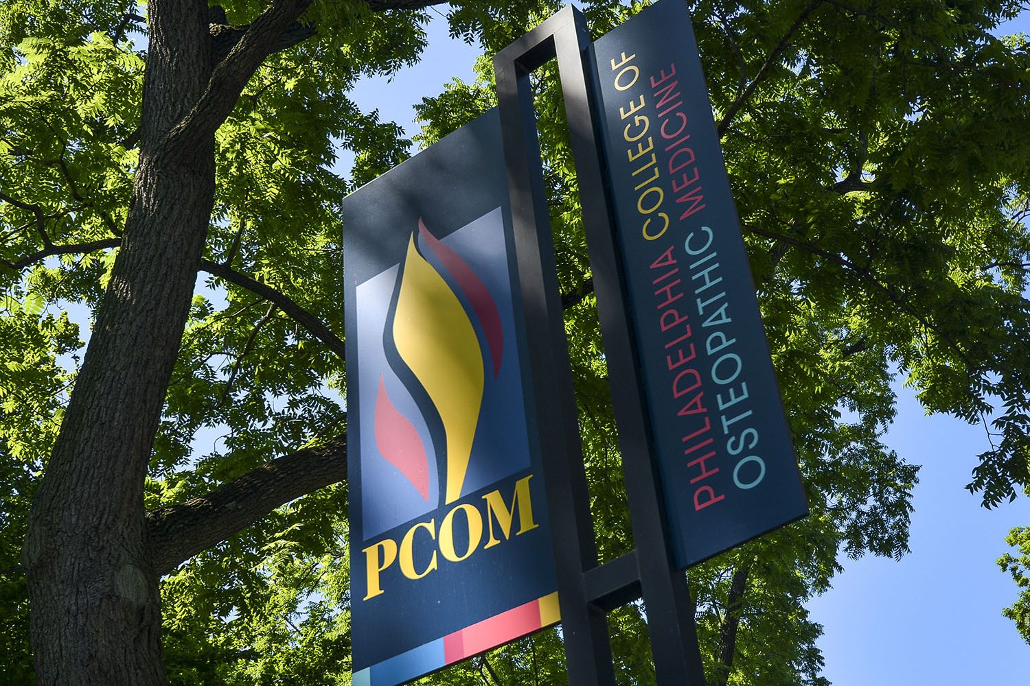 nearby: PCOM signage