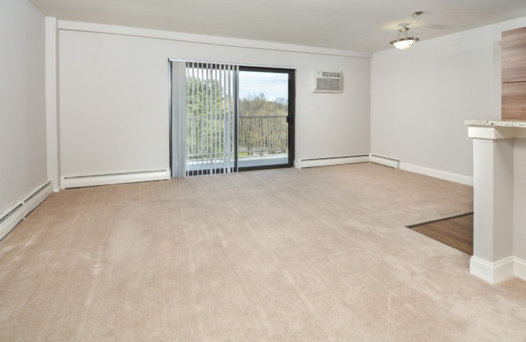 open living room with sliding doors to balcony