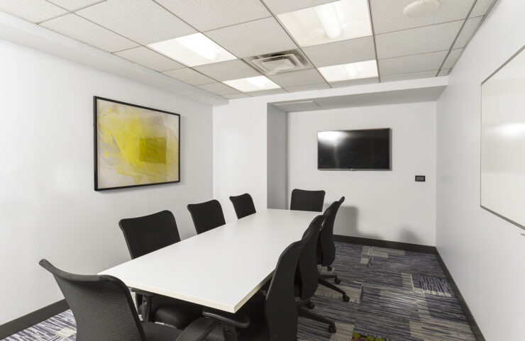 Conference Room with Large Table and Multi-Media Screen