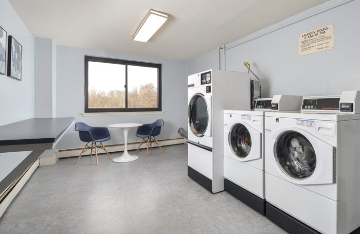 laundry room with seating 