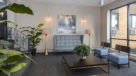 lobby with seating and large windows 