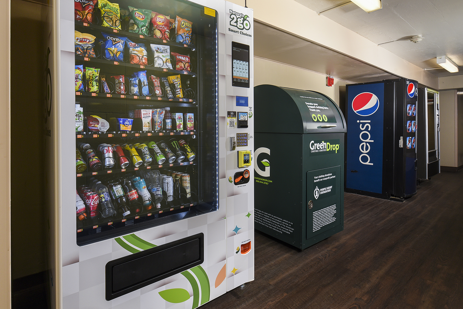 vending machines and green drop box