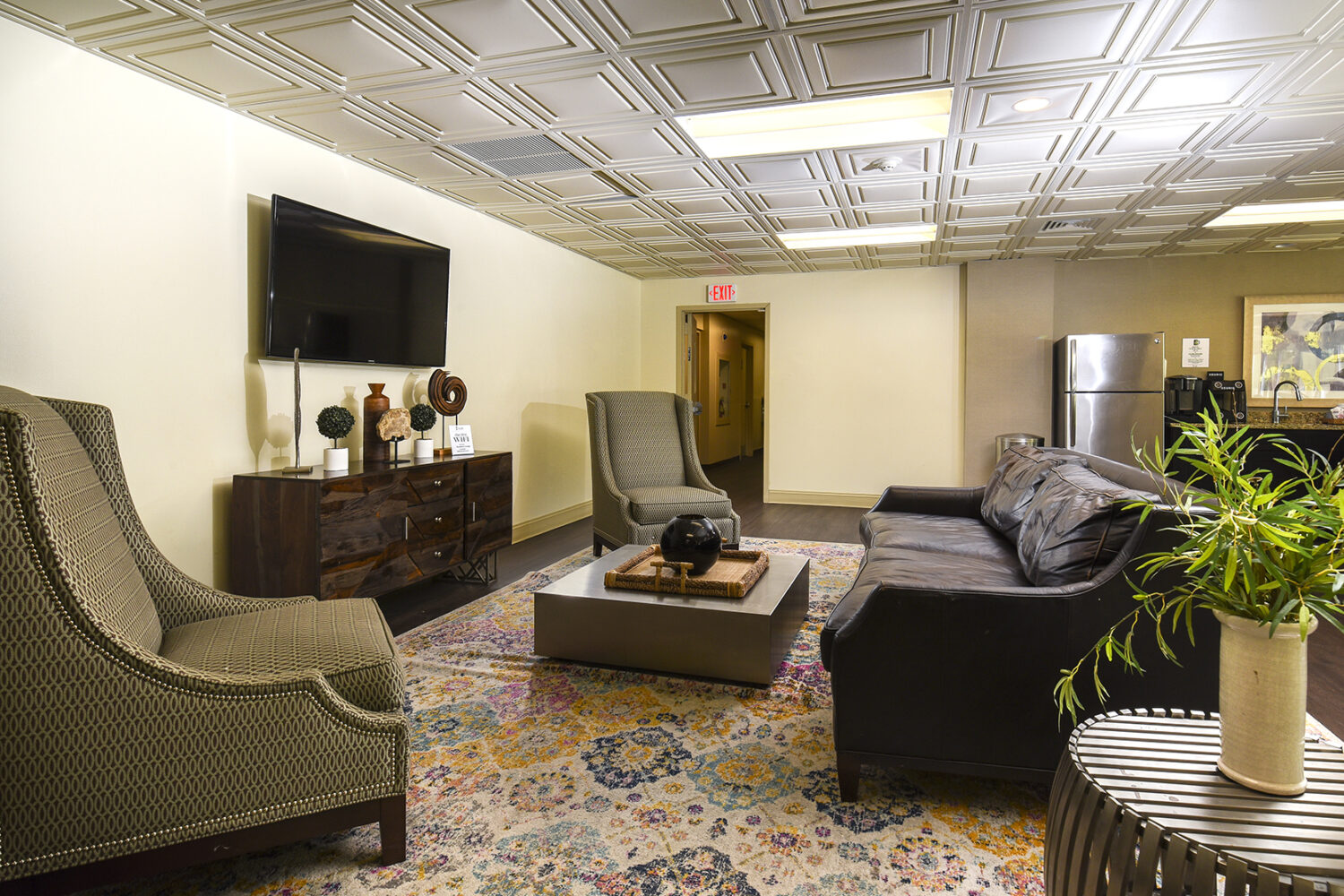 resident lounge with a variety of comfortable chairs
