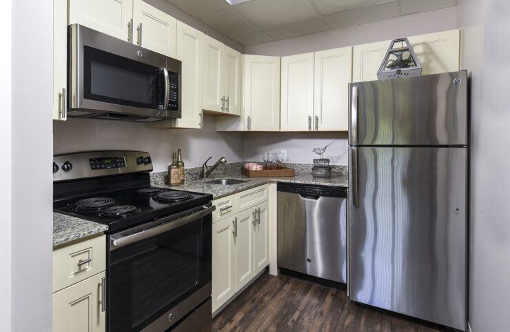 modern kitchen with white cabinets