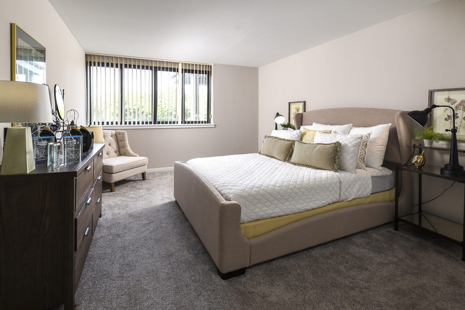 spacious bedroom with wall to wall carpet