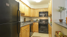 standard kitchen with oak colored cabinets 