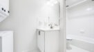 large bathroom with white tile in tub