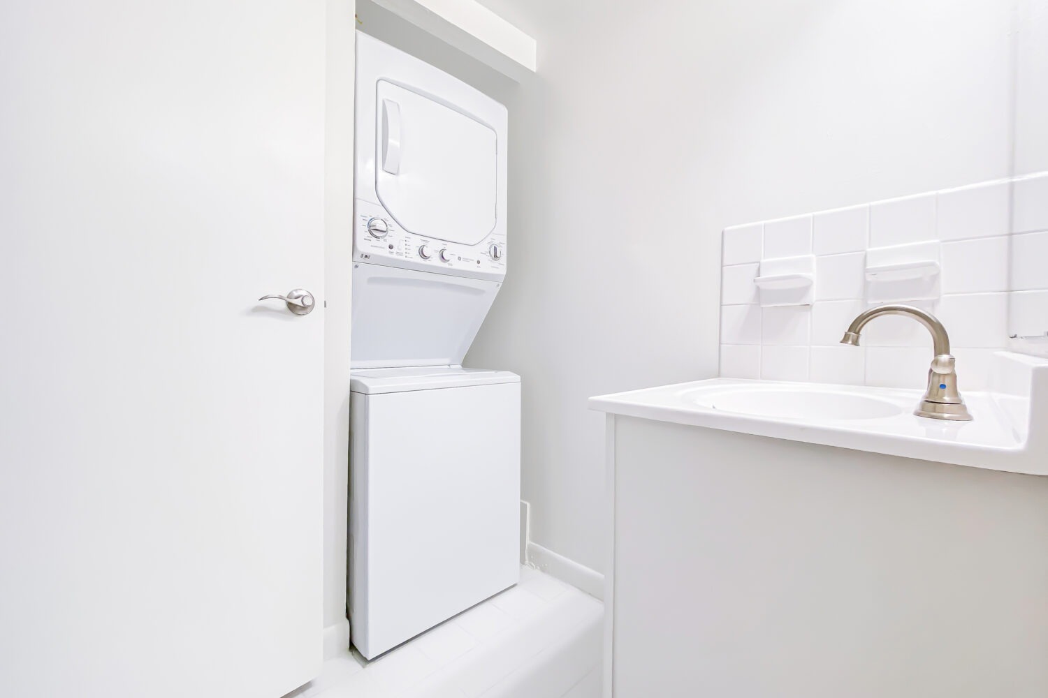 stackable washer and dryer outside bathroom