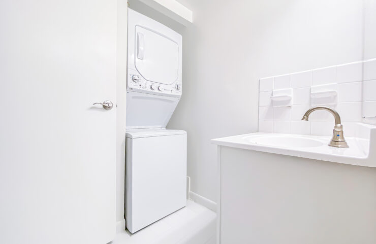 stackable washer and dryer outside bathroom